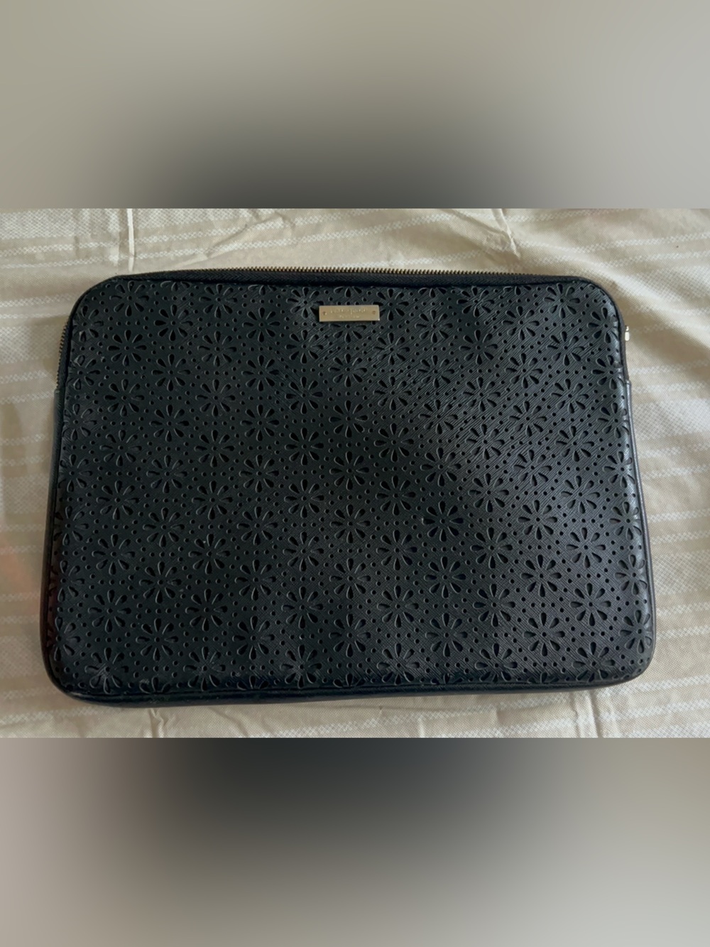 Kate Spade black perforated floral laptop sleeve for 13-inch devices
